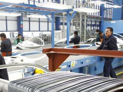 Para las empresas devolver la deuda sigue siendo poco costoso porque las tasas de interés están en niveles históricamente bajos. EFE / ARCHIVO