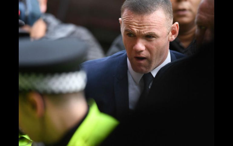 El goleador histórico del ManU fue arrestado el 1 de septiembre por manejar ebrio tras salir de un bar al norte de Manchester. AFP / P. Ellis