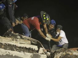 Las tareas de rescate en los edificios dañados avanzan. AP / M. Tovar