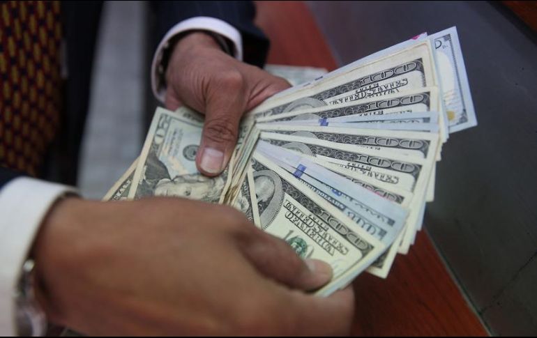 Prevén que el tipo de cambio se cotice entre 18.00 y 18.20 pesos por dólar. EL INFORMADOR / ARCHIVO