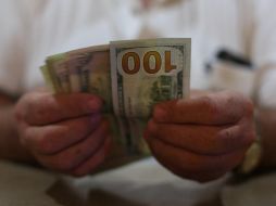 Prevén que el tipo de cambio se cotice entre 18.15 y 18.35 pesos por dólar. EL INFORMADOR / ARCHIVO