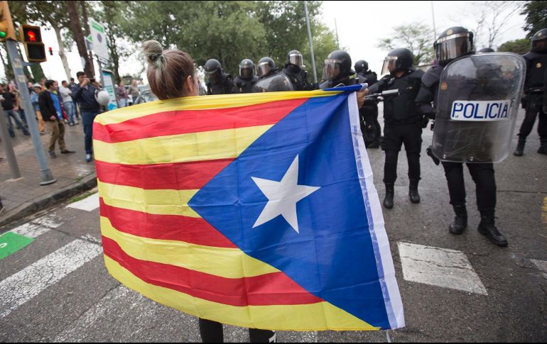 El presidente francés no menciona las escenas de violencia registradas este domingo en Cataluña. NTX / A. Salamé