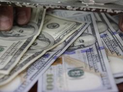 En el Diario Oficial de la Federación, el Banco de México informa que el tipo de cambio se ubica en 18.5522 pesos. EL INFORMADOR / ARCHIVO