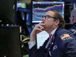 La sesión comenzó con dudas y sólo dos horas antes del cierre pareció agarrar dirección firme, para abajo. AP / ARCHIVO