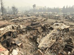 Las autoridades explicaron que al menos mil 500 edificios, entre viviendas y comercios, fueron destruidos. AFP / J. Edelson
