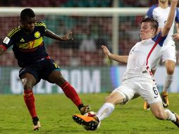 El colombiano Deiber Caicedo (I) logró la victoria apenas tres minutos antes del final, un marcador que los estadounidenses ya no consiguieron mover. AP / R. Kakade