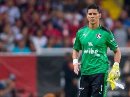 Oscar Ustari defenderá la cabaña rojinegra de los embates de Santos. MEXSPORT/ARCHIVO