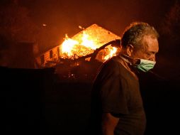 Las llamas han destruido al menos cinco mil 700 edificios. EFE/ N.Ferreira