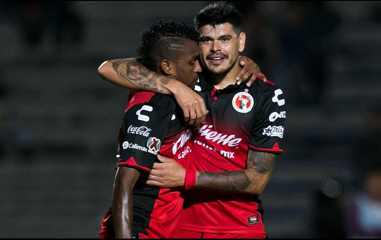 El delantero argentino Gustavo Leandro Bou, al minuto tres, y el ecuatoriano Miller Bolaños, al 38, consiguieron las anotaciones del equipo visitante. MEXSPORT /  Emiliano