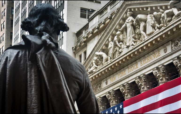 El NYSE Composite gana 21.30 puntos (0.17 por ciento) al operar en 12 mil 371.30 unidades. AP / ARCHIVO