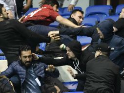 Enfrentados habitualmente al problema de la violencia en el futbol, las autoridades rusas han redoblado esfuerzos con el fin de controlar a los ''hooligans'' durante la Copa del Mundo. AFP / ARCHIVO