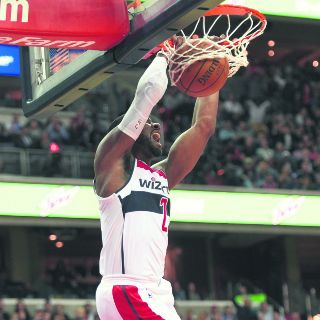 El inspirado John Wall hechizó a los 76ers