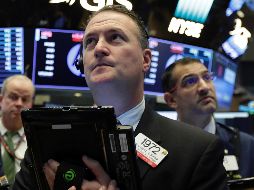 Por su parte, el NYSE Composite gana 22.09 puntos (0.18 por ciento) situándose en 12 mil 402.41 unidades,. AP / R. Drew