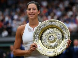 Muguruza ganó este año su segundo título de Grand Slam en el torneo de Wimbledon, y se colocó momentáneamente en la cima del tenis femenil. TWITTER / @WTA