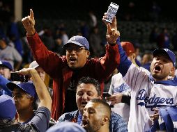Fanáticos angelinos han terminado con la espera de casi tres décadas para ver a los Dodgers disputar el cetro de las Grandes Ligas. EFE/T. Maury