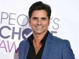 Señalaron que le propuso matrimonio a McHugh tras mostrarle un montaje de escenas románticas de películas de Disney. INSTAGRAM / johnstamos