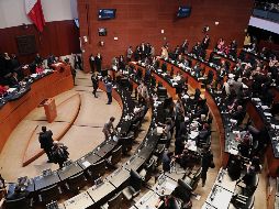 Por mayoría, los senadores avalaron los cambios que se hicieron en la Cámara de Diputados de elevar el tipo de cambio de 18.10 a 18.40 pesos por dólar. SUN / L. Godínez