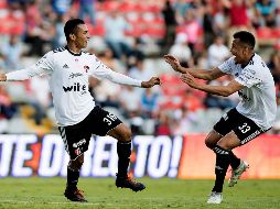 Ulises Cárdona celebra su gol que le dio el empate al Atlas. Mexsport/O. Martínez