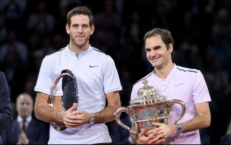 El tenista suizo (derecha) había ganado por última vez el torneo en 2015. AFP/ F. Coffrini
