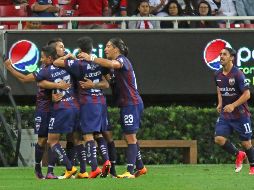 Atlante, que terminó jugando con 10 hombres por la expulsión de Tarragona, resistió los embates tapatíos. MEXSPORT / E. Quintana