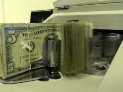 Banco BASE prevé que para hoy el tipo de cambio se cotice entre 18.95 y 19.20 pesos por dólar. AP / ARCHIVO