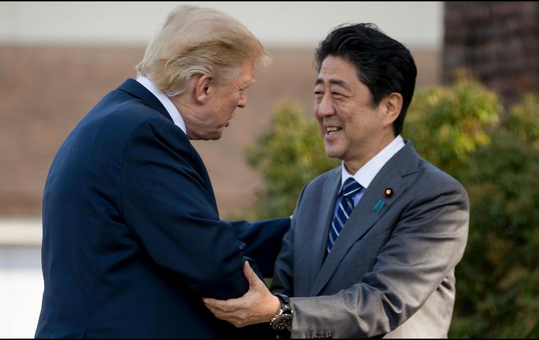 Trump y Shinzo Abe en el Kasumigaseki Country Club en Kawagoe, Japón. AP/A. Harnik