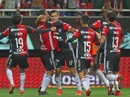 Jugadores del Atlas celebran su triunfo ante Chivas. Mexsport/E. Quintana