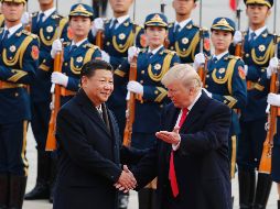 En sus primeras horas en la capital china, Donald Trump saludó al presidente Xi Jinping. AP/A. Wong