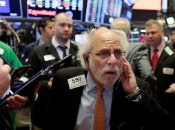 Pese al descenso, el índice Dow Jones ganó 103 unidades. AP/ ARCHIVO