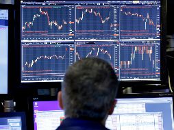 El indicador Dow Jones registró una pérdida de 0.58% y el Nasdaq 0.47 por ciento. AP/ R. Drew