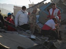 El líder supremo de Irán, Ali Jameneí, movilizó a todos los cuerpos de seguridad para acelerar las tareas de rescate y de remoción de escombros. AFP/F. Menati