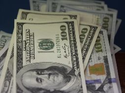 El dólar se adquirió en un precio mínimo de 17.90 pesos en sucursales bancarias de la capital del país. EL INFORMADOR/ ARCHIVO