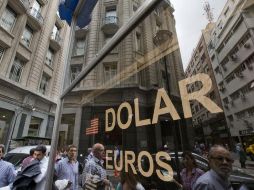 Banco Base prevé que el tipo de cambio se cotice entre 18.62 y 18.75 pesos por dólar. AP / ARCHIVO