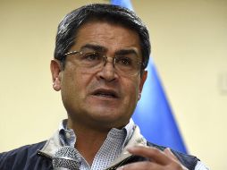 Hernández aseguró que el proceso debe realizarse bajo los establecimientos de la ley hondureña. AFP/J. Ordoñez
