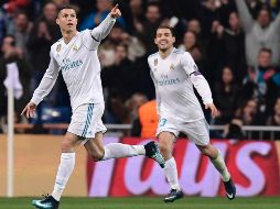 Cristiano (I) celebra su gol, anotado al minuto 12. AFP/J. Sorinao
