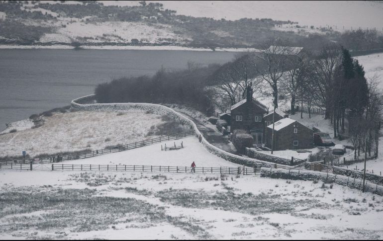 Advierten que ciertas zonas rurales, especialmente en Gales y el oeste de Inglaterra, pueden quedar incomunicadas por la nieve. AFP/O. Scarff