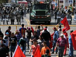 Estallaron por todo Honduras protestas con neumáticos y palos encendidos en calles, así como saqueos de negocios. AFP / O. Sierra