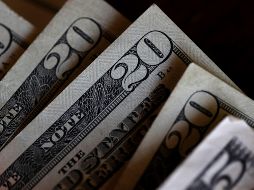 De acuerdo con el Banxico el tipo de cambio es de 18.9740 pesos. AFP / ARCHIVO