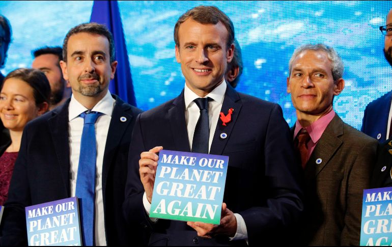 El nombre del programa impulsado por Macron es una respuesta al lema de campaña de Trump, que retiró a EU del Acuerdo de París sobre el Cambio Climático. AFP/P. Wojazer