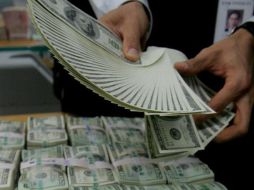 Banco Base prevé que el tipo de cambio oscile entre 19.10 y 19.25 pesos por dólar. EL INFORMADOR / ARCHIVO