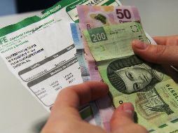 Del dinero recibido, un porcentaje de trabajadores dice que destinará el dinero completo al pago de adeudos, mientras que el otro comprará regalos navideños. EL INFORMADOR / ARCHIVO