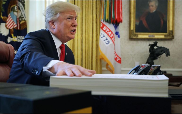 Donald Trump indicó que la aprobación de la Reforma Fiscal ya está generando una positiva reacción en la iniciativa privada estadounidense. AFP/C. Somodevilla