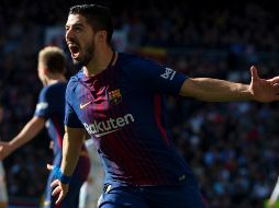 Suárez ha anotado en 131 ocasiones vistiendo la camiseta del Barcelona. AFP/C. de a Torre