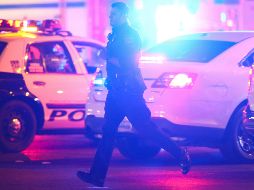 Los policías al llegar a eso de la medianoche vieron a una de las víctimas en el piso afuera del establecimiento. AP/ARCHIVO