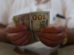 Prevén que el peso mexicano cotice entre 19.65 y 19.85 pesos por dólar en cotizaciones interbancarias a la venta. EL INFORMADOR / ARCHIVO