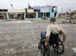 Trump dice que la gente de Houston está manejando la ''histórica'' tormenta tropical ''Harvey'' ''sorprendentemente bien''. AP / C. Sacco