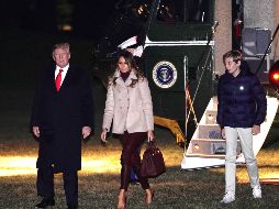 Trump, su esposa Melania y su hijo Barron a su llegada a Washington. AFP/M. Ngan