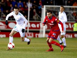 Bale (I) abrió la cuenta para el Madrid al minuto 35. EFE/J. Belver
