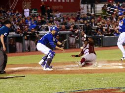 Ronnier Mustelier marca la segunda carrera para los Guindas, impulsado por un sencillo de Sebastián Elizalde. EL INFORMADOR/M. Vargas