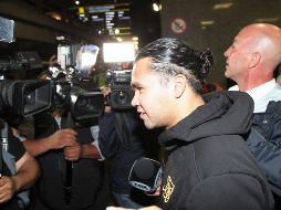 A su arribo al aeropuerto internacional de la Ciudad de México, Peña evitó dar declaraciones. NTX/G. Durán